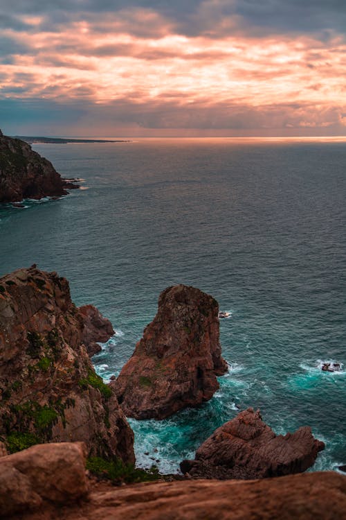 Mediterranean ocean cliffs at golden hour sunset