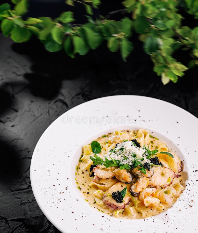 Elegant pasta and seafood combination dish